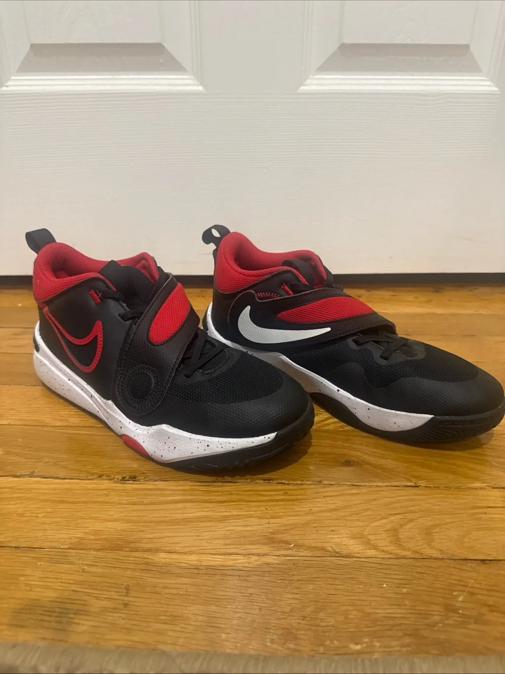Nike Team Hustle Kids Black and Red Velcro Strap Sneakers